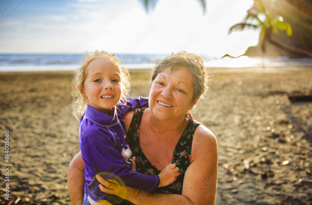 Senior woman having great time on Costa rica beach with her grandchild Senior woman having great time on Costa rica beach with her grandchild