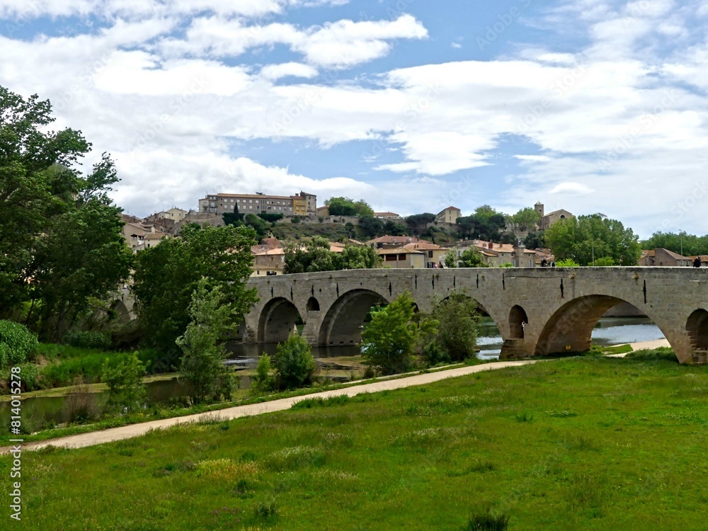 Fototapeta premium Béziers, May 2024: Visit the magnificent city of Béziers in Occitanie. Street photos - View of Saint-Nazaire and Saint-Celsus cathedrals With the Pont Vieux