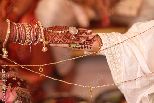 Hast melap a Hindu Indian Wedding Tradition of Bride and Groom, Bride Hand Jwellery | Hindu Wedding Background photo