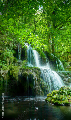 Beautiful spring waterfall Dokuzak in Strandzha Mountain, Bulgaria . Strandja mountain, waterfall in the forest. Magnificent landscape near Burgas
