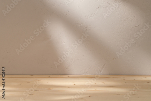 Empty table mockup on stucco background with abstract sun light reflections on the wall.