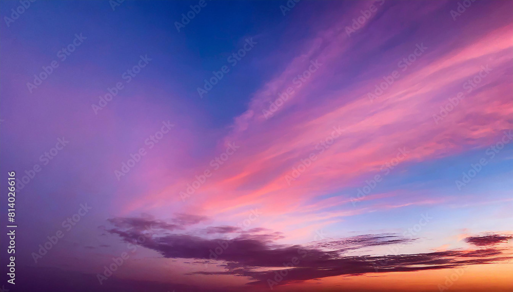 Beautiful sunset sky background. Colorful twilight sky with cloud.