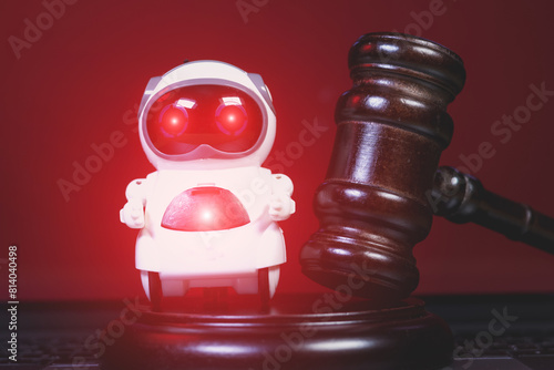 Judge Hammer for adjudication to the Real Robot. Adjudgement Gavel with wooden stand. Lawyer decision about Digital  assistant. Court of law. Pronouncing sentence to the AI Artificial Intelligence.