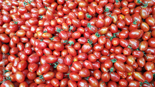 Fresh  cherry tomatoes as background