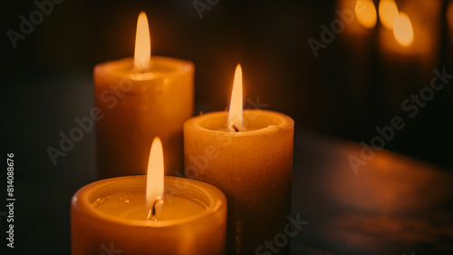 Illuminated Candles with Warm Bokeh Background