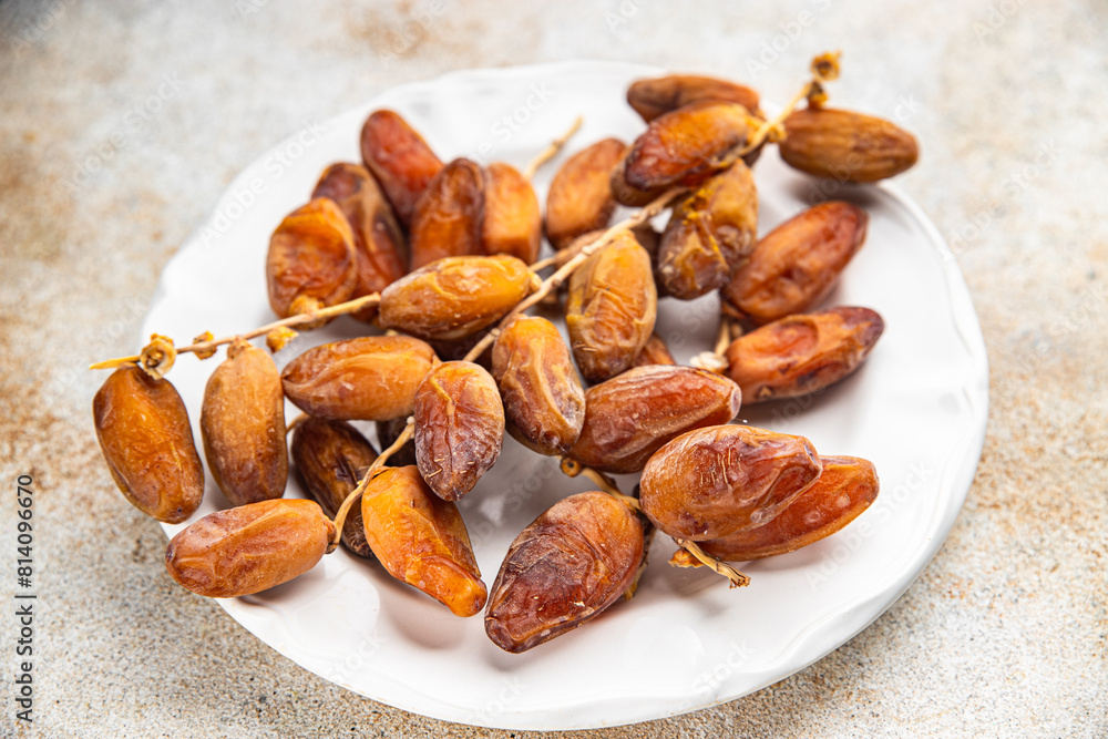 date branch dried fruit fresh appetizer food snack on the table copy space food background rustic top view date branch dried fruit fresh appetizer food snack on the table copy space food background rustic top view