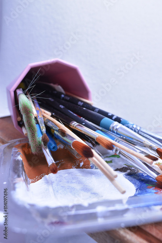 a set of dirty brushes and paintbrushes from having painted too much