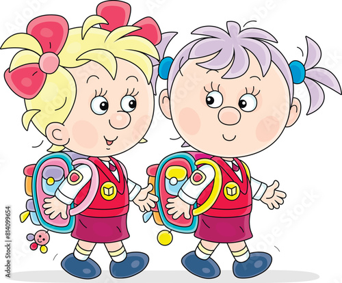 Happy little schoolgirls wi...