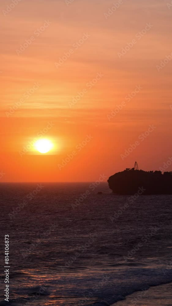 Vertical video - Timelapse of the Sun setting on the ocean Vertical video - Timelapse of the Sun setting on the ocean
