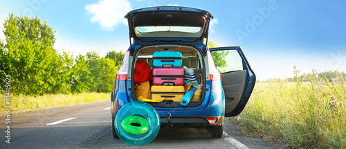 Photography Modern car with luggage outdoors