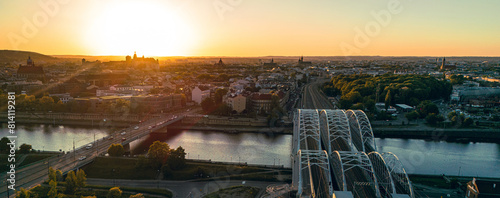 Panorama of Krakow and Wawel Castle in the background at sunset, drone shot.