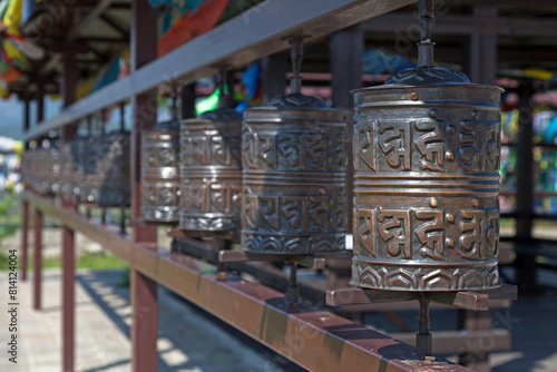 Spinning Tibetan Buddhist prayer wheels at Datsan Rinpoche Bagsha in Ulan-Ude photo