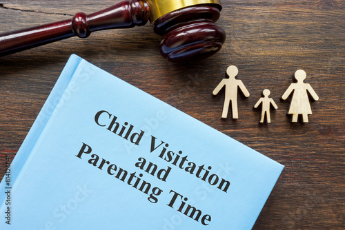 Book child visitation and parenting time and gavel. photo