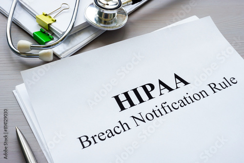 Photography Documents HIPAA breach notification rule on the table.