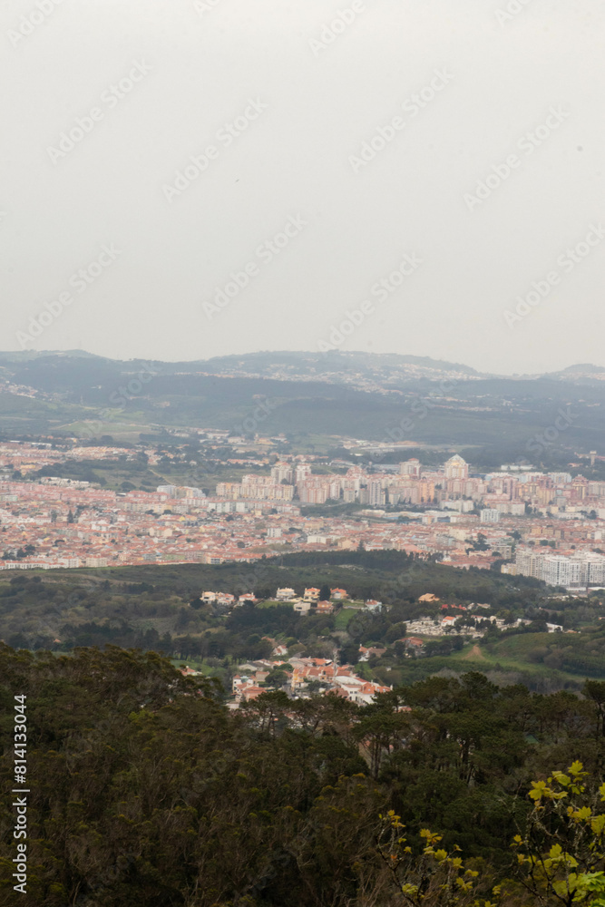 Obraz premium View of Buildings on the Hillside from the Moorish Castle in Sintra Portugal
