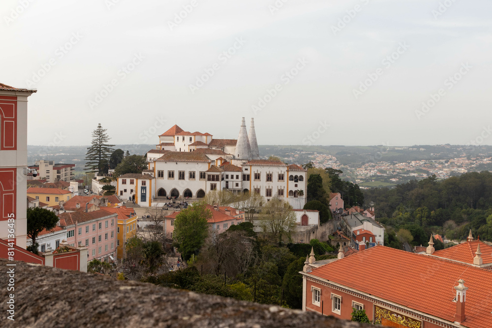 Obraz premium View of Colorful Buildings Stacked Along a Hillside in Sintra Portugal