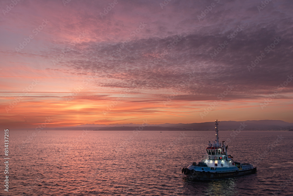 Tugboat at sunrise Tugboat at sunrise
