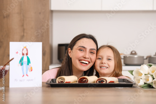 Happy mother and daughter b...