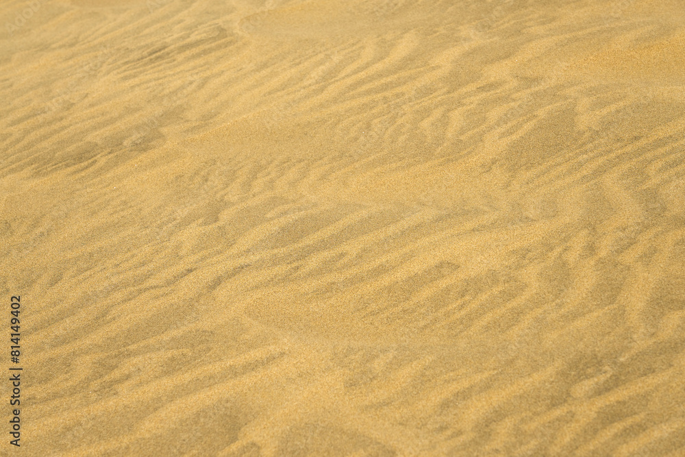 The texture of sand in the desert as a natural background. The texture of sand in the desert as a natural background.