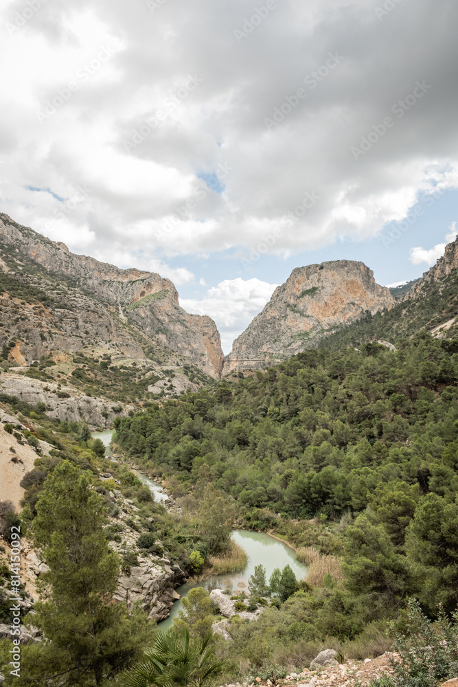 hiking trail caminito del rey, kings walkway, in Malaga Spain. narrow footpath leads through natural beauty mountain range cliff faces of gaitanes gorge. hisotric landmark popular tourist attraction hiking trail caminito del rey, kings walkway, in Malaga Spain. narrow footpath leads through natural beauty mountain range cliff faces of gaitanes gorge. hisotric landmark popular tourist attraction
