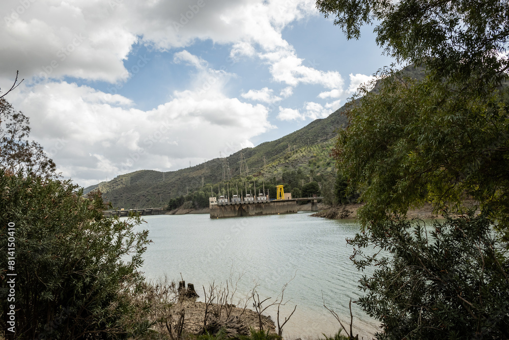 hydroelectric power plant station makes electricity for much of Malaga in Spain. enchanted gorge near Caminito Del Rey mountain hike in El Chorro uses water from reservoir dam to generate clean energy