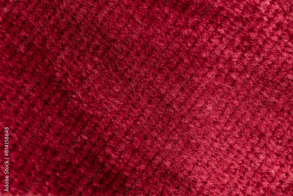 Fototapeta premium Closeup of pink corduroy cloth as patterned textured background
