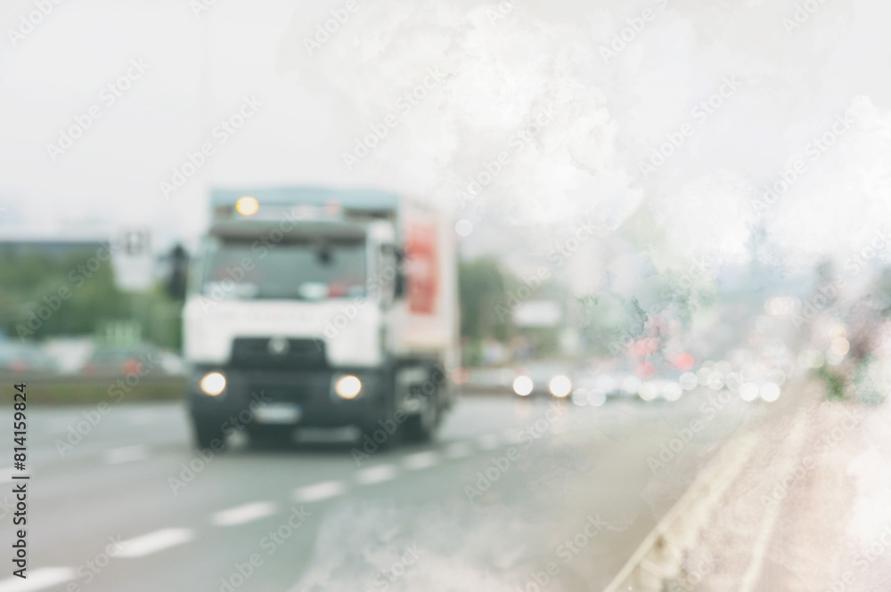 Environmental pollution. Air contaminated with fumes in city. Cars surrounded by exhaust on road, blurred view Environmental pollution. Air contaminated with fumes in city. Cars surrounded by exhaust on road, blurred view