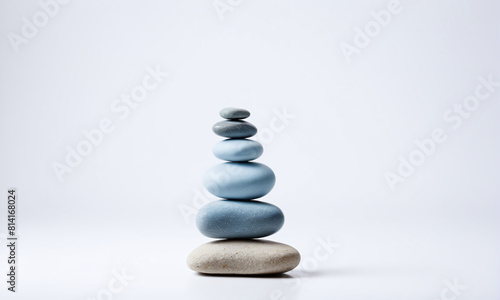 Sculptural Harmony  A tower of balanced rocks embodying natural equilibrium and tranquility. Light white background