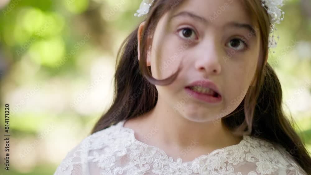 First Communion sweet girl in white dress and crown making faces.MOV First Communion sweet girl in white dress and crown making faces.MOV