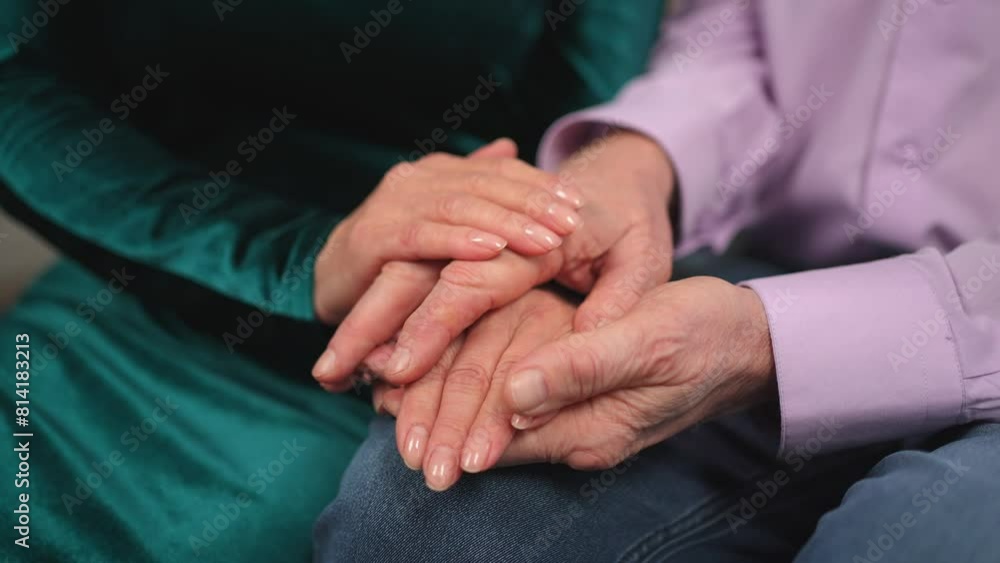 Old couple hands. Senior couple in love holding hands. Mid age old husband wife touching hands with tenderness love enjoying wellbeing. Grandmother grandfather together. Family moment love and care Old couple hands. Senior couple in love holding hands. Mid age old husband wife touching hands with tenderness love enjoying wellbeing. Grandmother grandfather together. Family moment love and care