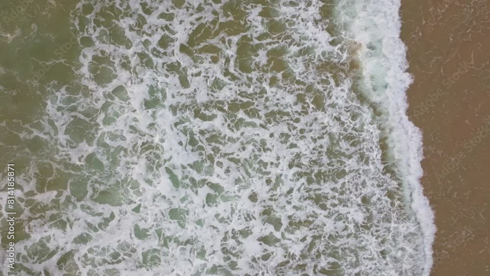 A drone captures contrasting colors of ocean waves A drone captures contrasting colors of ocean waves