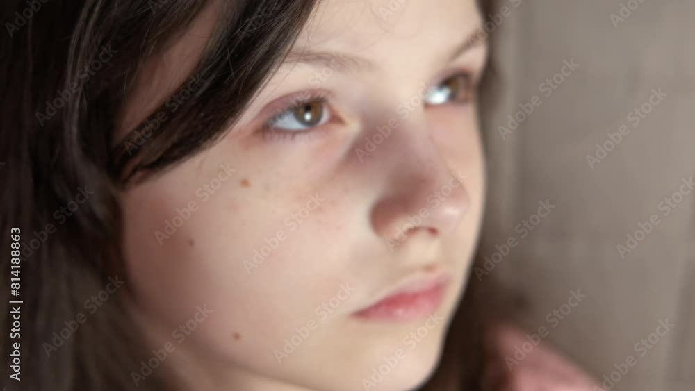 Lovely freckles on child cheeks. A view of happy little girl with lovely freckles in the room. Lovely freckles on child cheeks. A view of happy little girl with lovely freckles in the room.