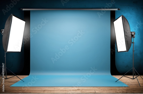 blue studio backdrop with two box studio lights