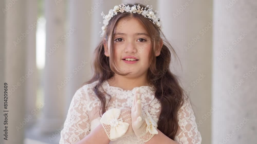 First Communion beautiful girl in white dress joking  and making faces.MOV