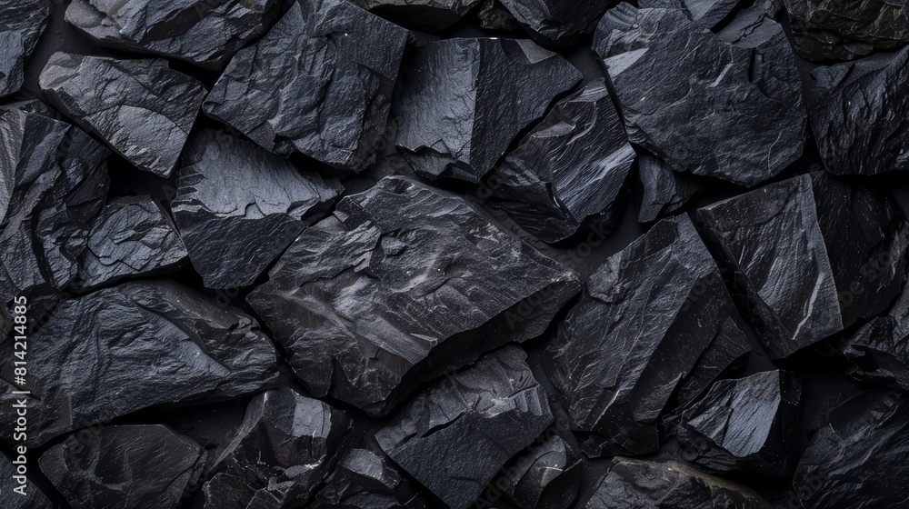 Black rough stones. Can be used as a background for text, or as a texture. Black rough stones. Can be used as a background for text, or as a texture.
