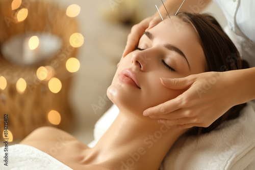 Serene Woman Enjoying a Facial Acupuncture Therapy at a Well-Lit Spa