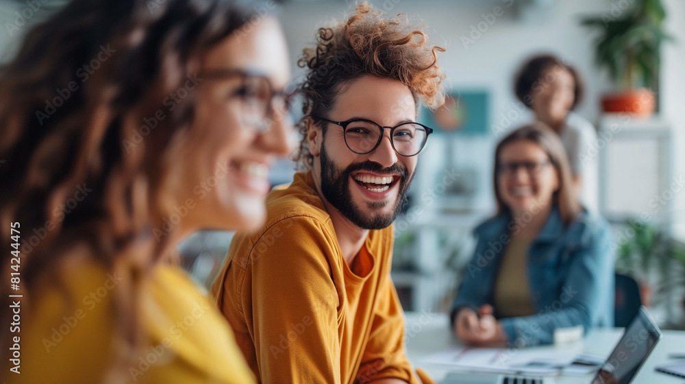 Group of People Laughing in an Office Group of People Laughing in an Office