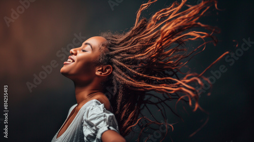 Woman With Dreadlocks Blowing in the Wind