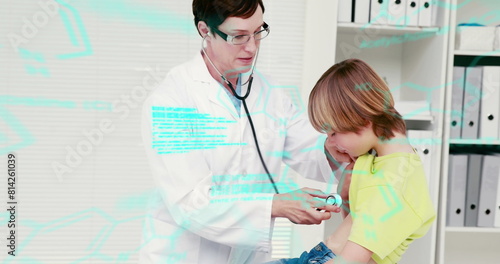 Image of scientific data over caucasian female doctor examining boy