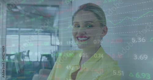 Image of stock market data processing against caucasian woman smiling at office
