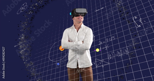 Image of businessman wearing vr headset over equations and solar system