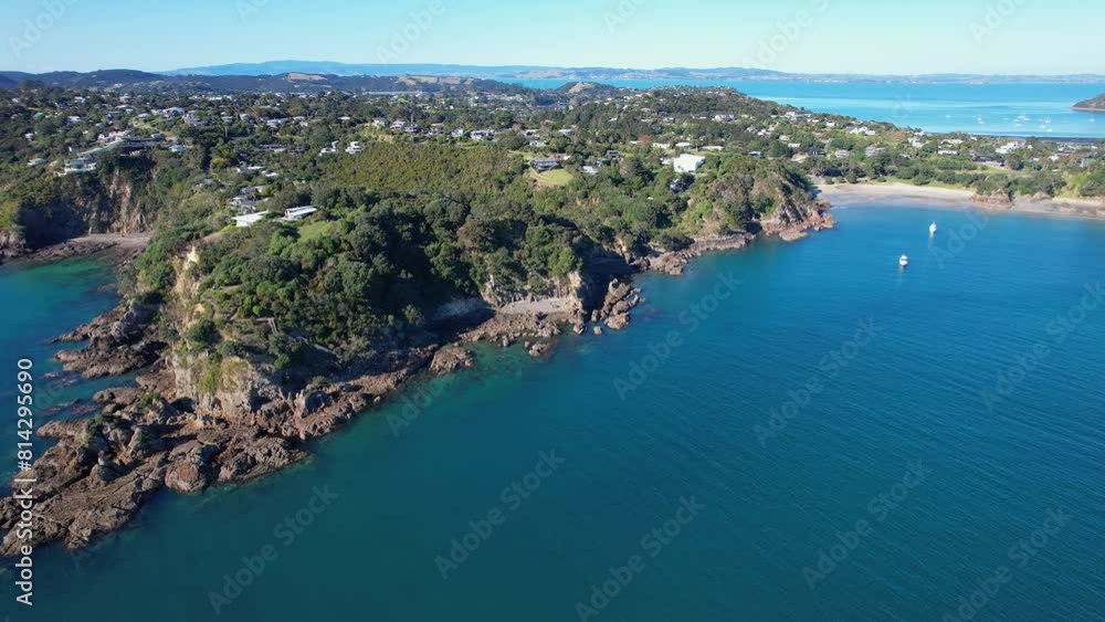 Fishermans Rock And Newton Reserve On Oneroa Bay In Waiheke Island, New Zealand. aerial shot Fishermans Rock And Newton Reserve On Oneroa Bay In Waiheke Island, New Zealand. aerial shot