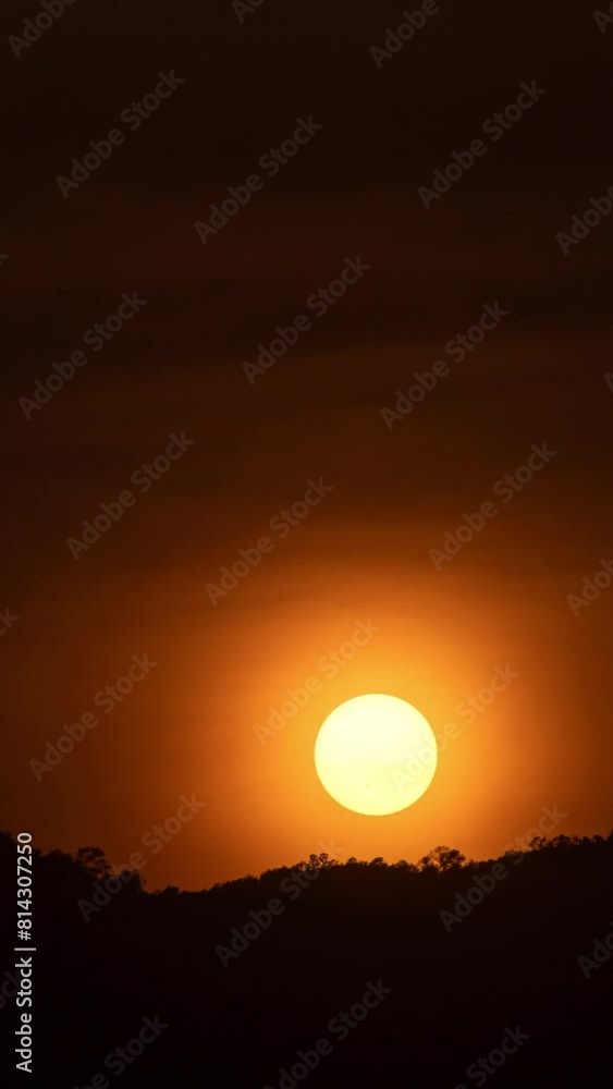 Timelapse of dramatic sunset with orange sky in a cloudy day. Timelapse of dramatic sunset with orange sky in a cloudy day.