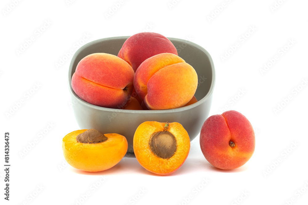 Group of fresh apricots isolated on a white background Group of fresh apricots isolated on a white background