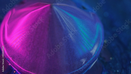 Neon paint. Iridescent geometric. Defocused pink purple blue color fluorescent sparkling multifaceted crystal drip liquid reflecting texture party light abstract art background.