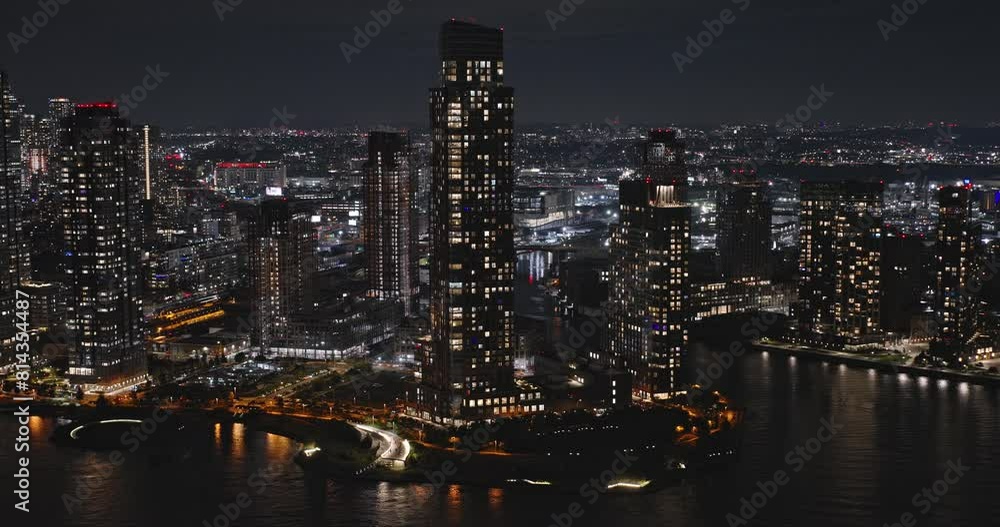NYC New York Aerial v183 establishing shot drone flyover East river capturing illuminated waterfront cityscape of Hunters Point at Long Island City at night - Shot with Inspire 3 8k - September 2023 NYC New York Aerial v183 establishing shot drone flyover East river capturing illuminated waterfront cityscape of Hunters Point at Long Island City at night - Shot with Inspire 3 8k - September 2023