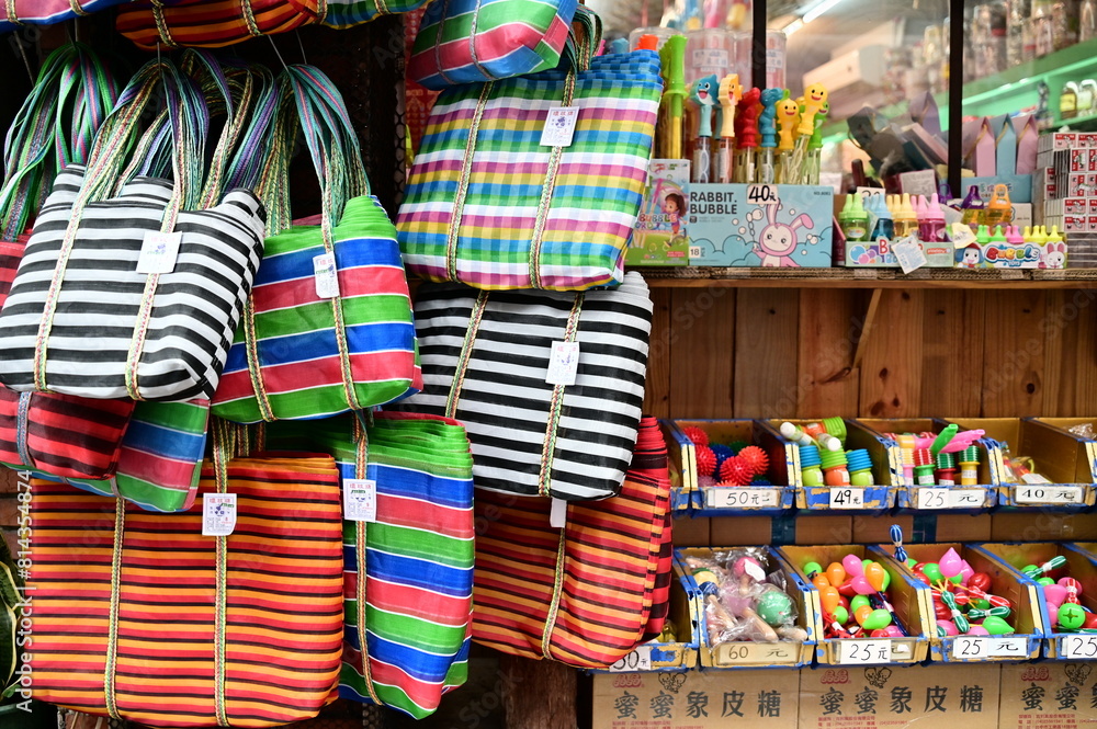 TW-01.30..24: Gaji bags, iconic in Taiwan, are not only popular locally but also garner international attention, often purchased by tourists as souvenirs, representing Taiwan's unique cultural blend.