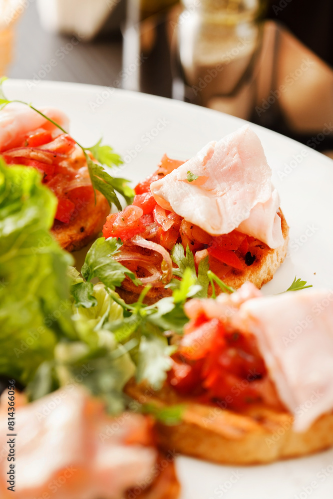 Bruschetta with tomato and ham Bruschetta with tomato and ham