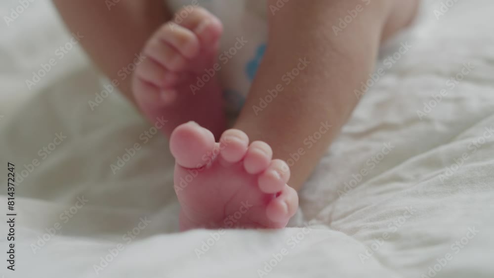 Closeup barefoot of newborn baby lying on baby bed relax and comfortable. Closeup barefoot of newborn baby lying on baby bed relax and comfortable.