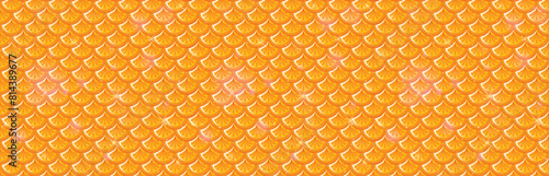 Abstract golden scales in a seamless pattern